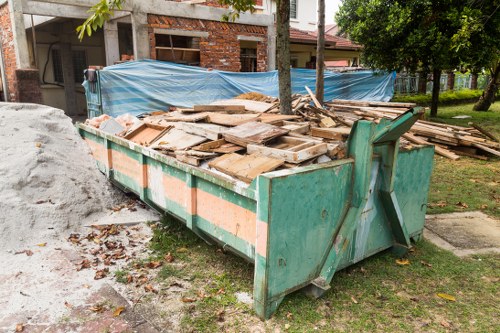 Professionals performing house clearance in a Haringey home
